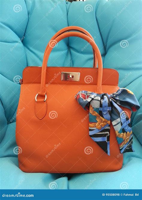 birkin bag with scarf.